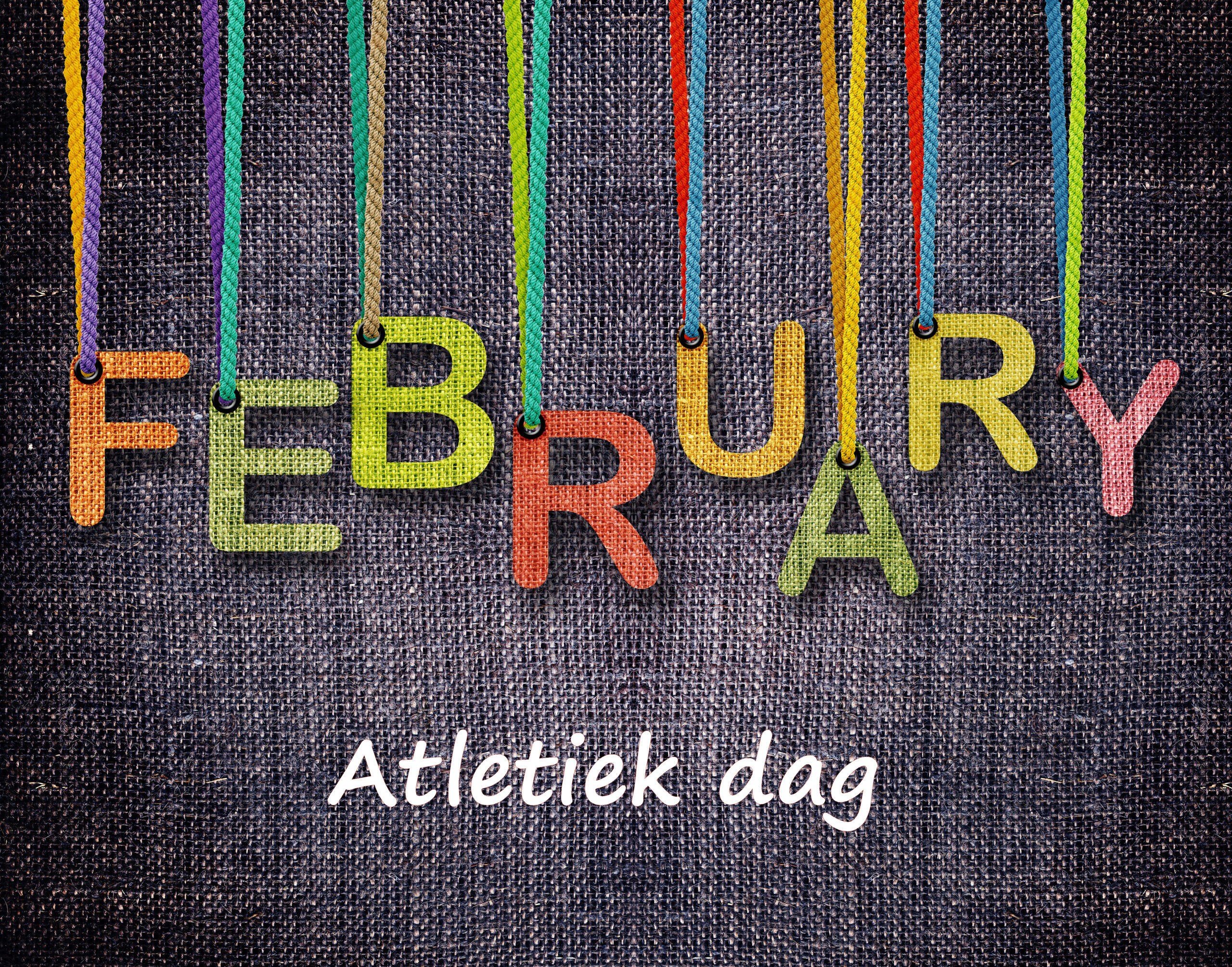 February letters hanging strings with blue sackcloth background.